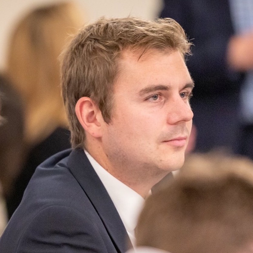 Close Up of blonde haired man in business suit